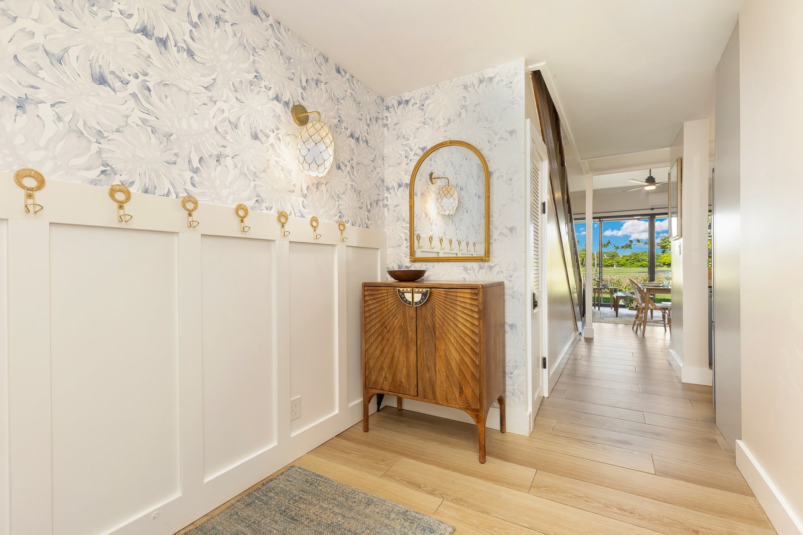 Step inside to vaulted ceilings and a light-filled entry that sets the tone for your north shore stay.