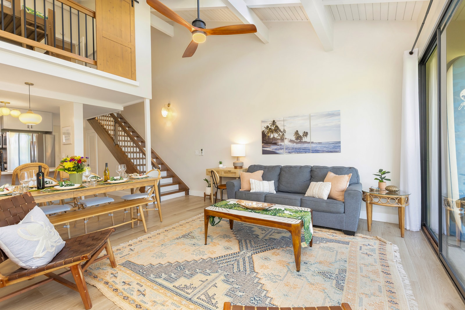 After a day in the sun, this relaxed space welcomes you home with volume ceilings and tropical textures.