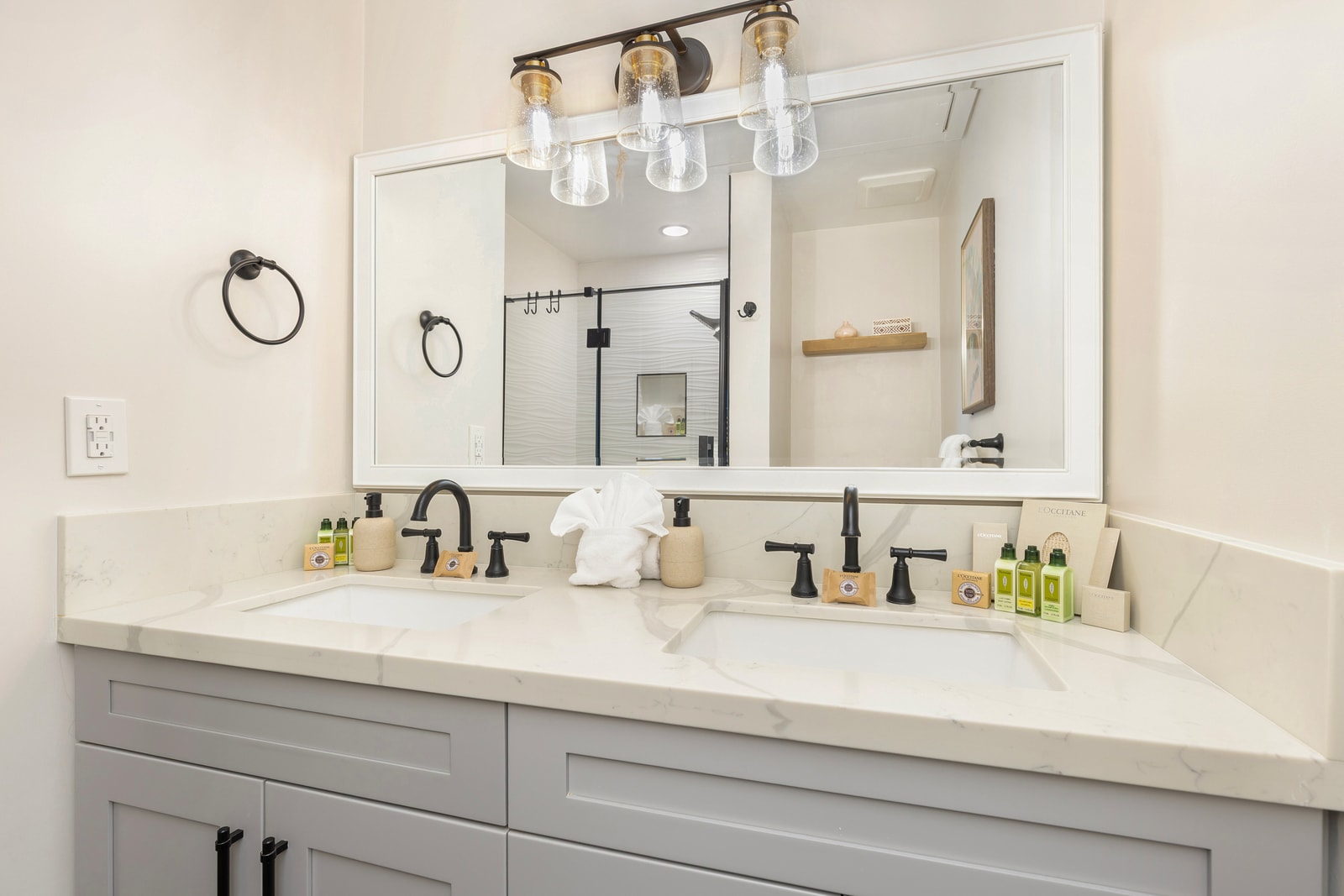 Your full en-suite bathroom includes a walk-in shower and dual vanity.