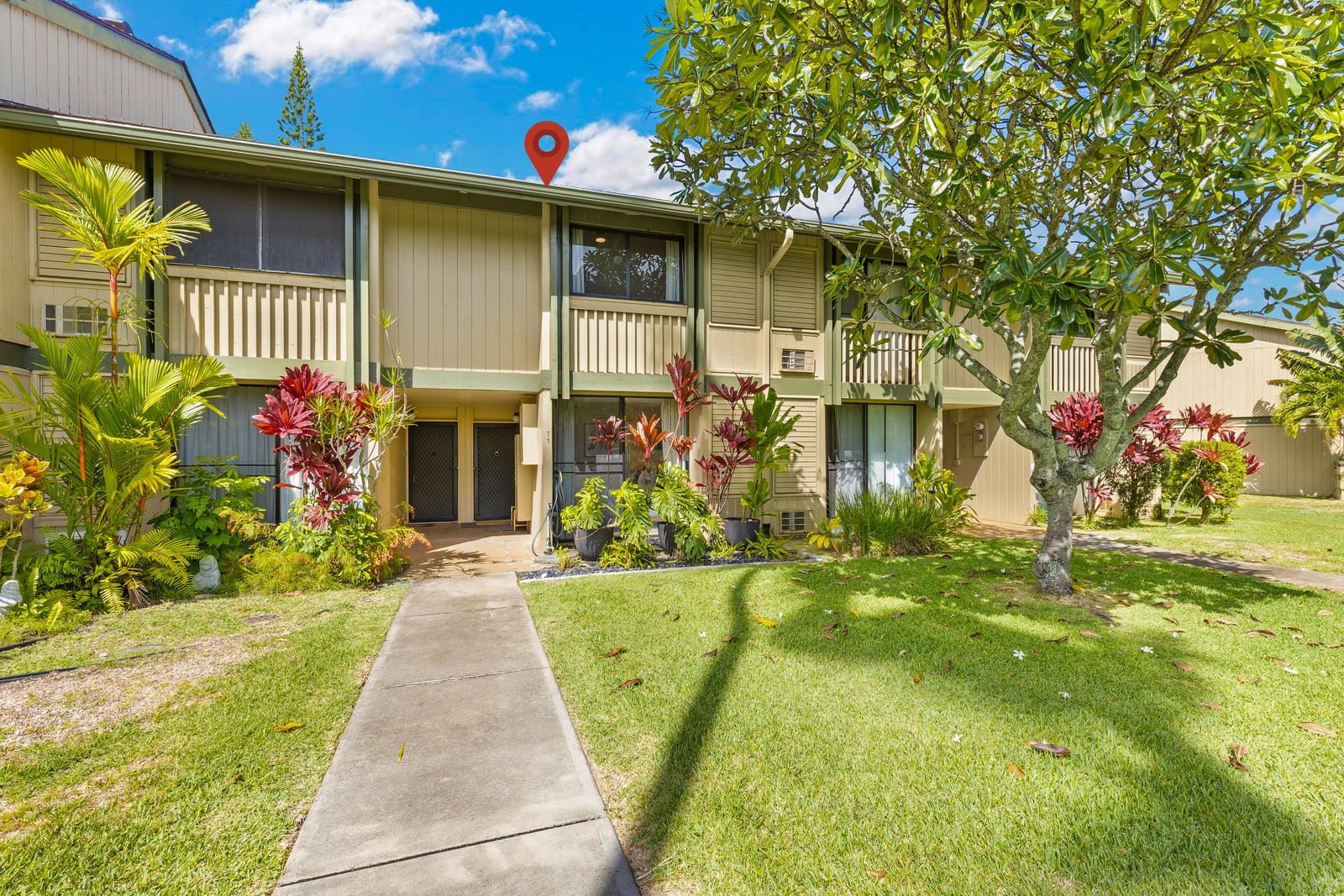 Lush tropical landscaping surrounds your private north shore retreat on Oahu.