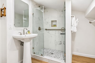 Clean lines and plenty of light—your guest bathroom provides a crisp, fresh start to your mornings.
