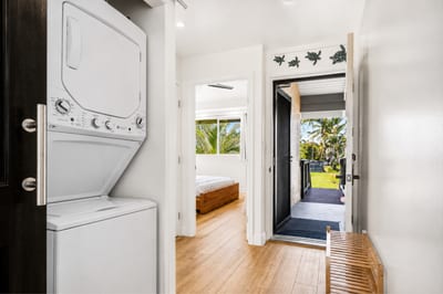 Pack light with your in-unit laundry—essential for keeping your vacation wardrobe fresh. KUL-W145