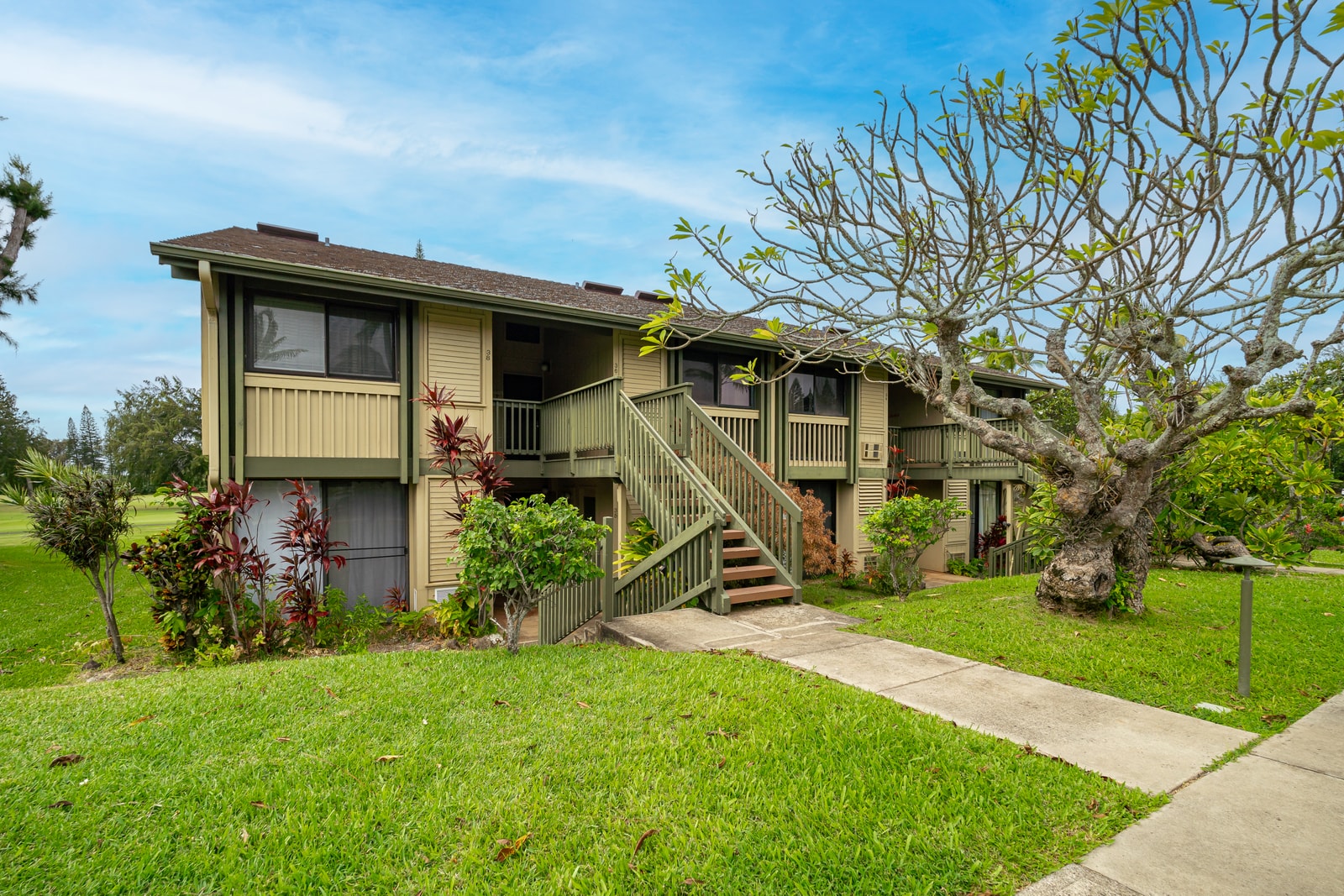 Ground-floor entry and lush landscaped paths set a tranquil tone at KUL-W35.