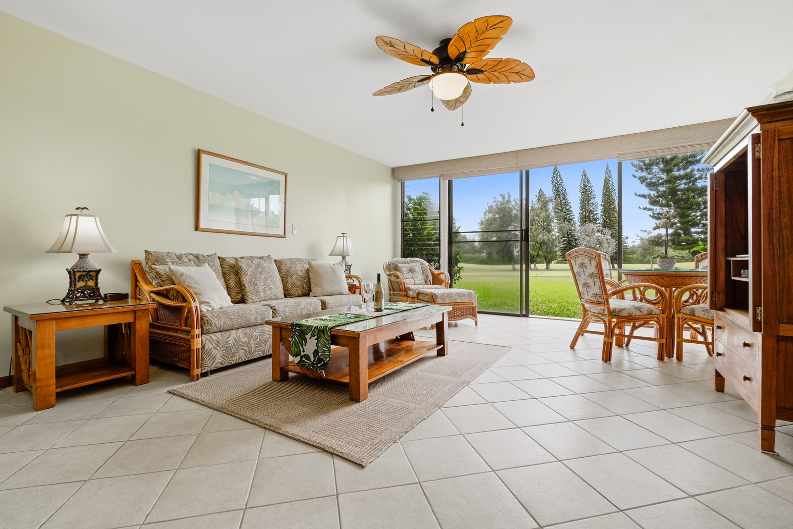 Wall-to-wall windows frame peaceful garden views and fill the living area with natural light.