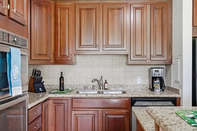 Thoughtful touches like a drip coffee maker and double sink elevate the kitchen setup.