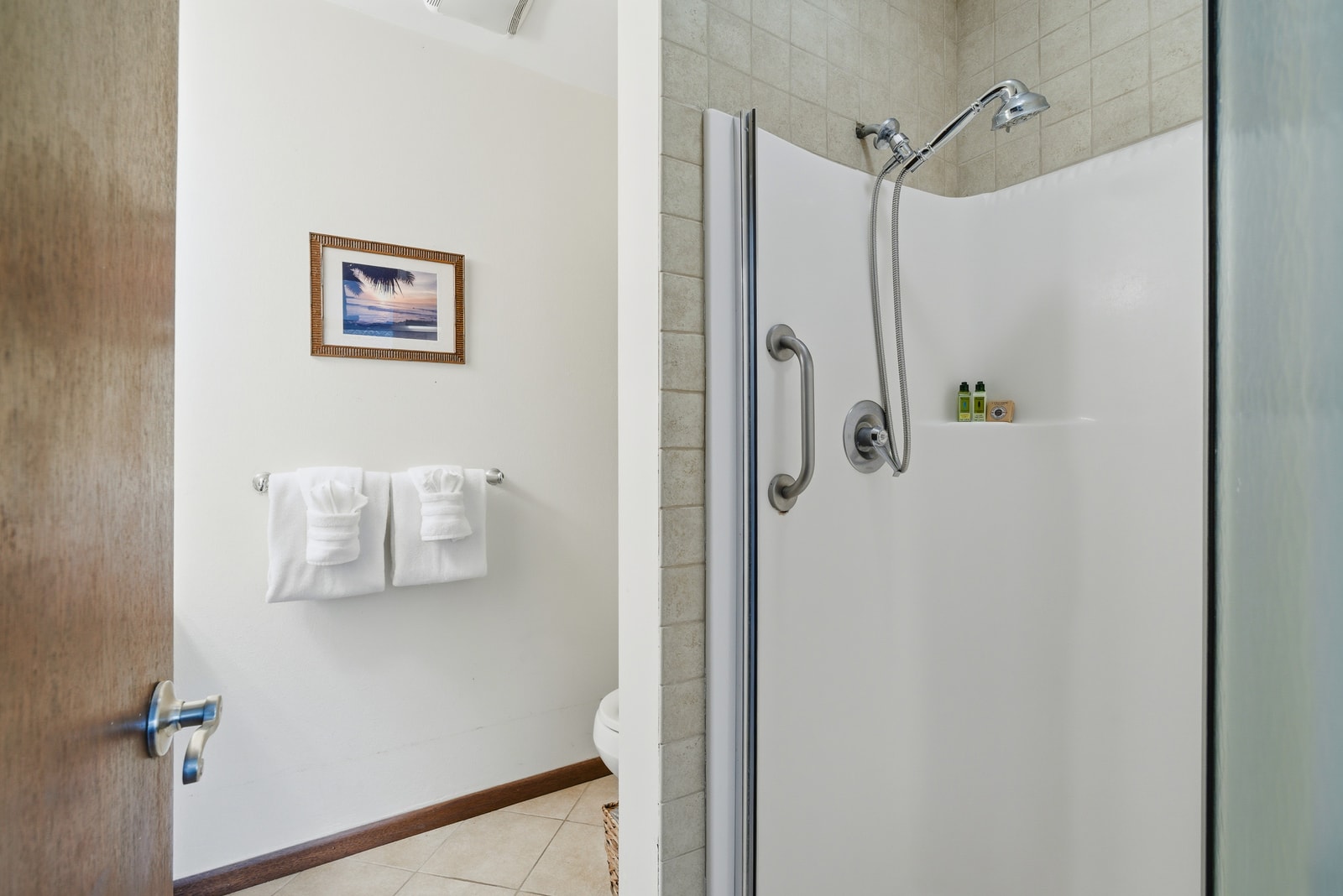 Walk-in shower in your ensuite bathroom offers easy access and a clean finish.