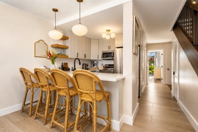 Bar seating invites casual conversation while you prep island snacks or mix up tropical drinks.