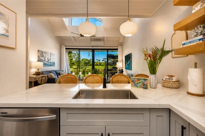 Whip up meals with ease in this stylish kitchen with plenty of prep space and open views to the living area.