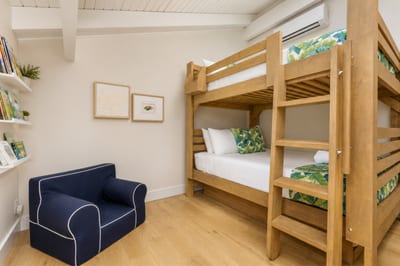 Queen-over-Queen bunks and an additional Full, pull-out bed makes this loft-style room great for larger groups.