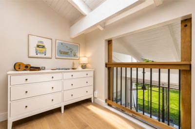 Slide the barn doors closed for extra privacy and take advantage of the dresser for all your travel essentials and storage needs.
