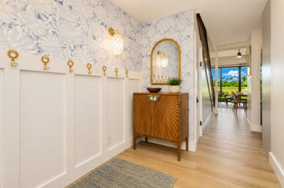 Step inside to vaulted ceilings and a light-filled entry that sets the tone for your north shore stay.