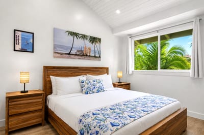 The primary bedroom features a plush king size bed and hotel grade linens for a resort like stay KUL-W145