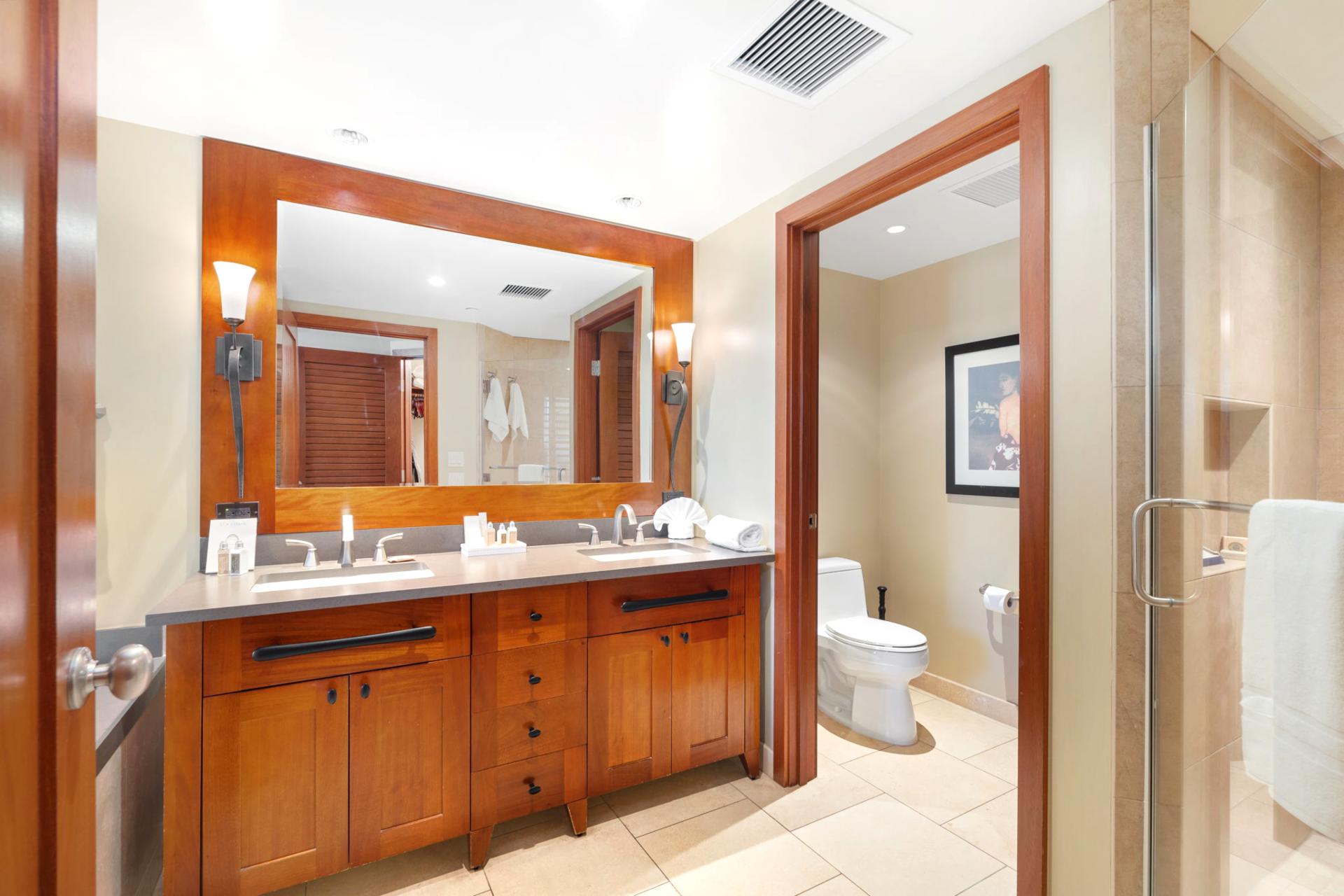  A peaceful master bath featuring polished fixtures and thoughtful touches for a little vacation pampering—every single day   