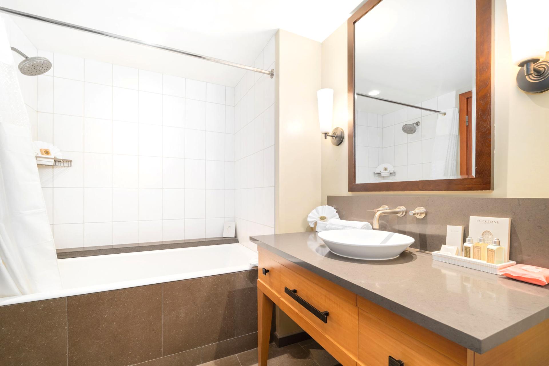    Unwind in the oversized tub or step into the glass-walled shower—this master bath is built for calm and comfort 