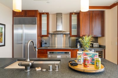 Your morning coffee gets a side of sea breeze, thanks to lanai doors that disappear like a magician’s trick