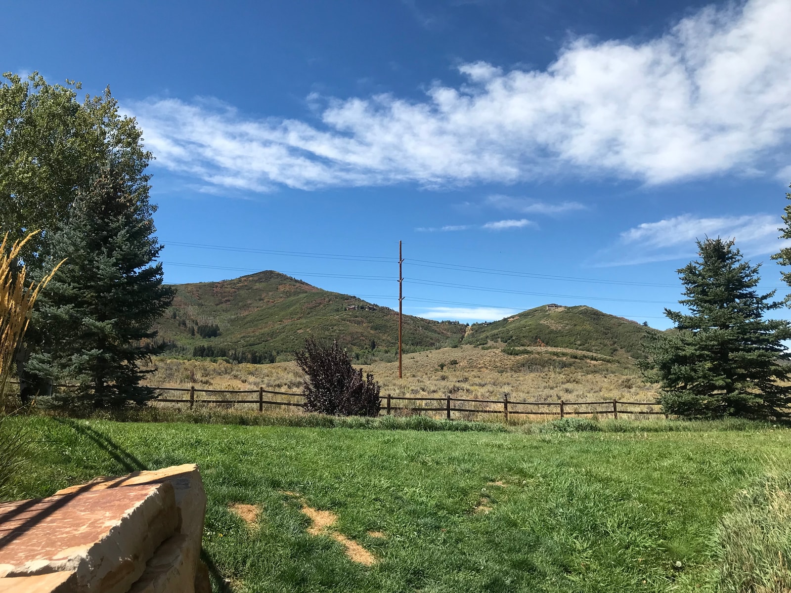Mountains and meadows stretch beyond your balcony, an ever-changing view in every season.