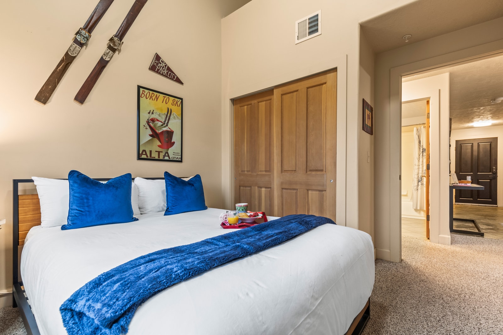 Alternate angle of the second bedroom shows layout and closet storage.