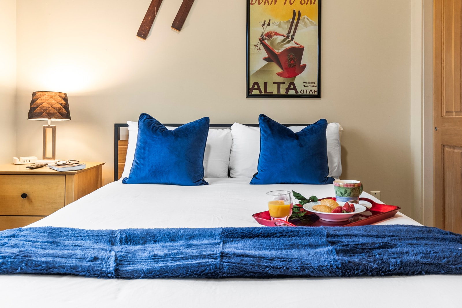 Second bedroom with Queen bed, mountain artwork, and soft bedding for a cozy night’s rest.