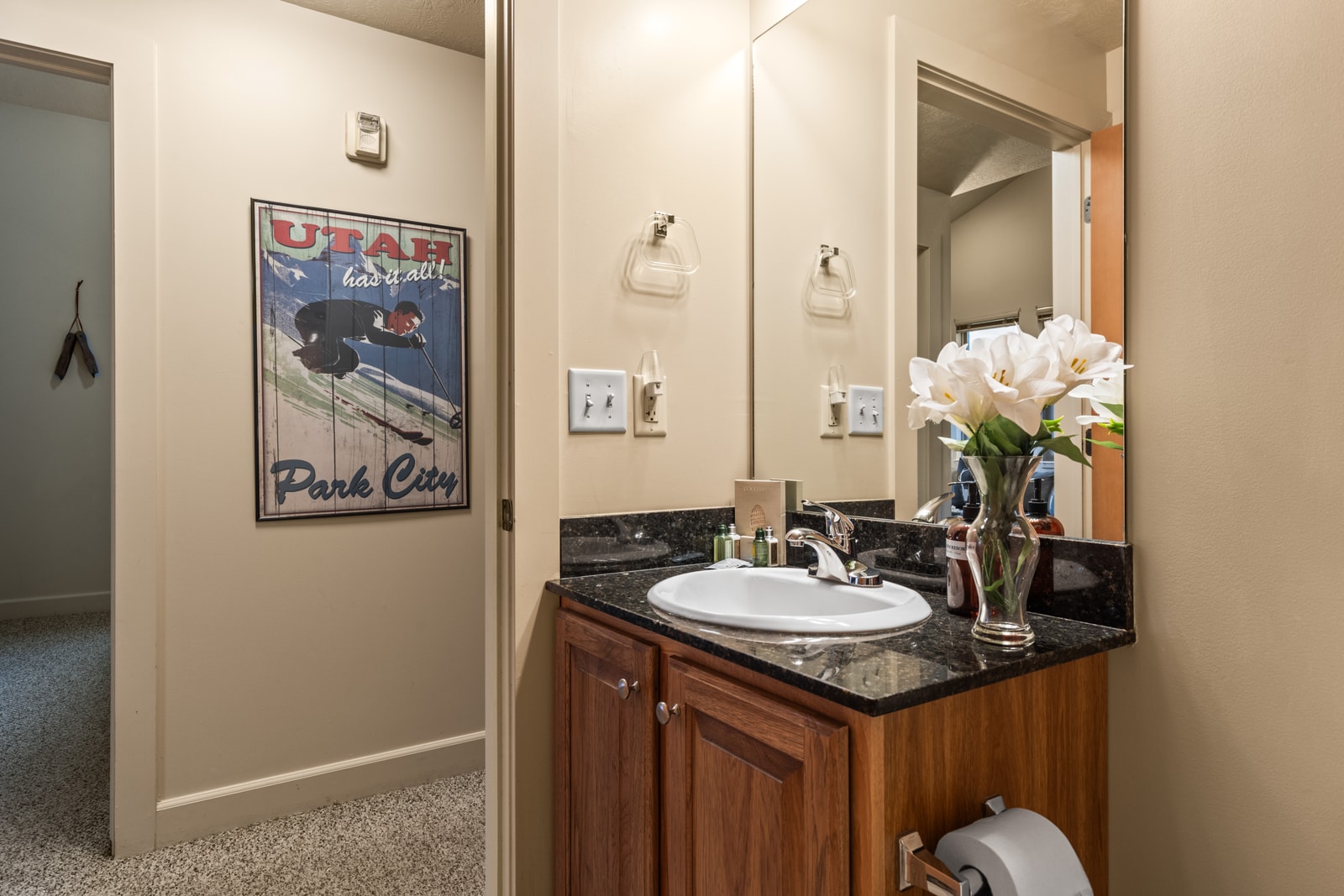 Thoughtfully stocked guest bath with elegant finishes and all the essentials.