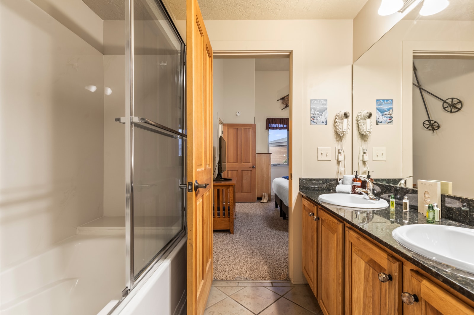 Dual vanities and plenty of space make sharing easy in the primary bath.