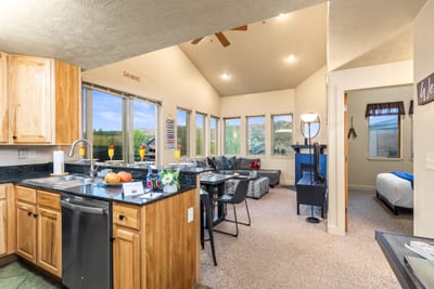 Kitchen island seating blends seamlessly into the dining area for easy meals and conversation.