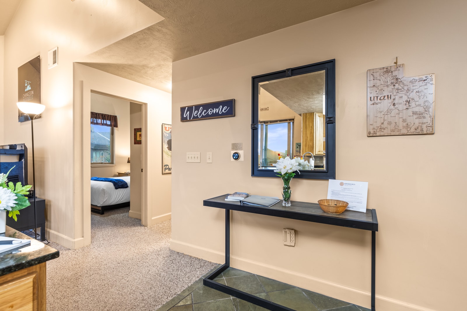 Entryway features a bench and mirror for easy arrivals, departures, and mountain gear.