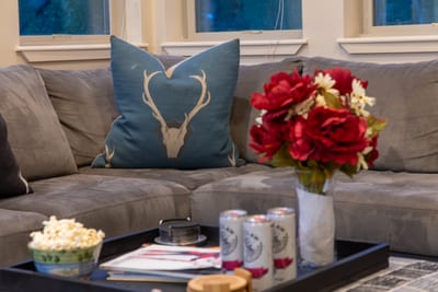 Coffee, cocktails, or a movie night. This cozy corner is ready for all your vacation moments.