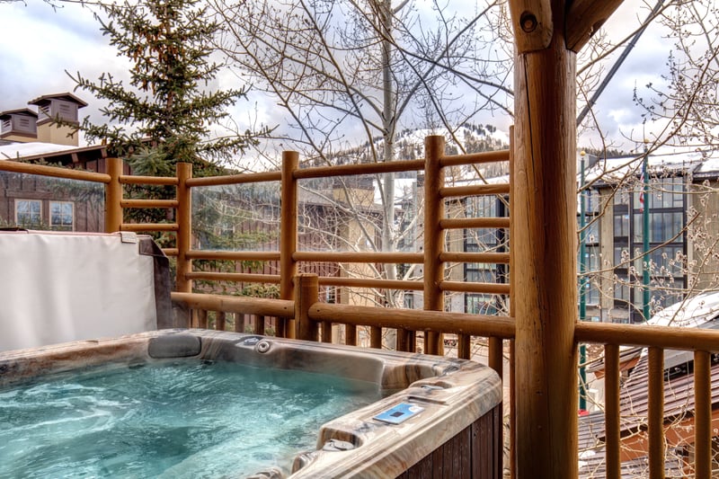 Enjoy soothing jets from your private hot tub just outside your unit.
