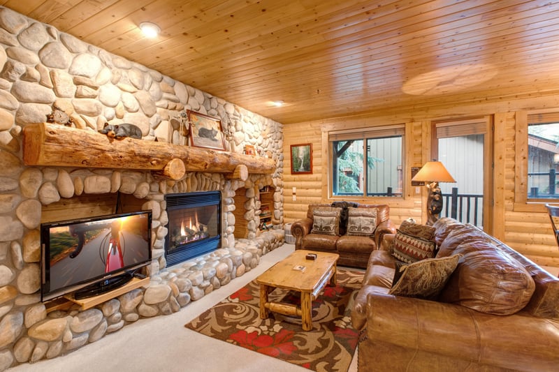 Settle in by the gas fireplace and stream your favorite shows on the wall-mounted Smart TV.