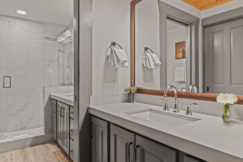 Bathroom counters and a walk-in shower give your master bath a touch of alpine luxury. BBL-351A