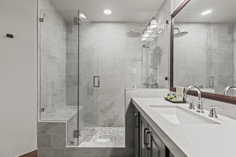The primary bath includes dual vanities, a walk-in shower, and high-end finishes. BBL-351A