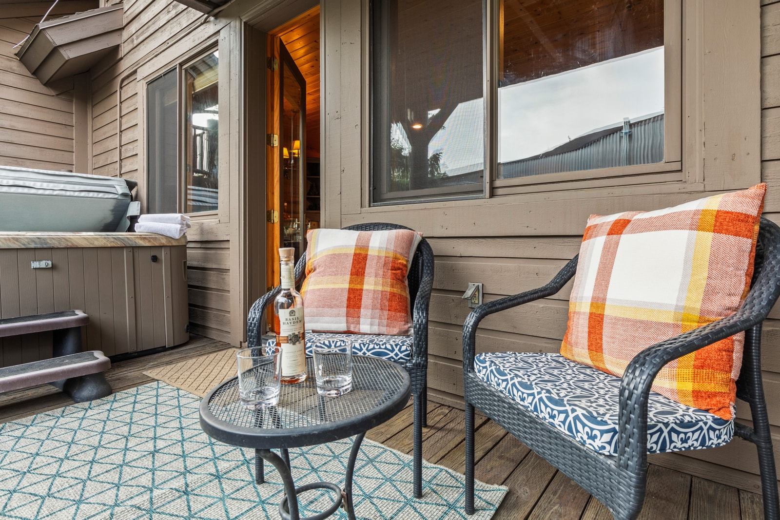 This quiet balcony nook is perfect for reading or winding down after a day outdoors. BBL-351A