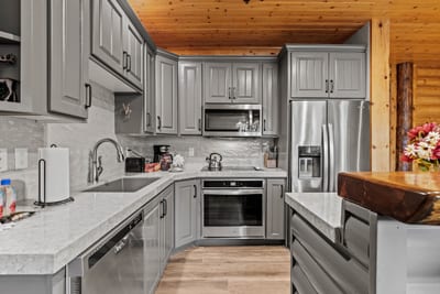 Your kitchen is fully equipped with appliances and bar seating, perfect for prepping breakfast before a day on the slopes. BBL-351A