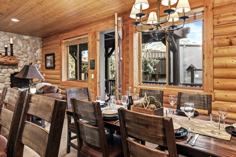 Enjoy mountain ambiance as you dine beneath the chandelier in the warmly lit dining area. BBL-351A