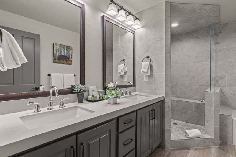 Dual sinks and counters make your primary bath ideal for couples or sharing with ease.