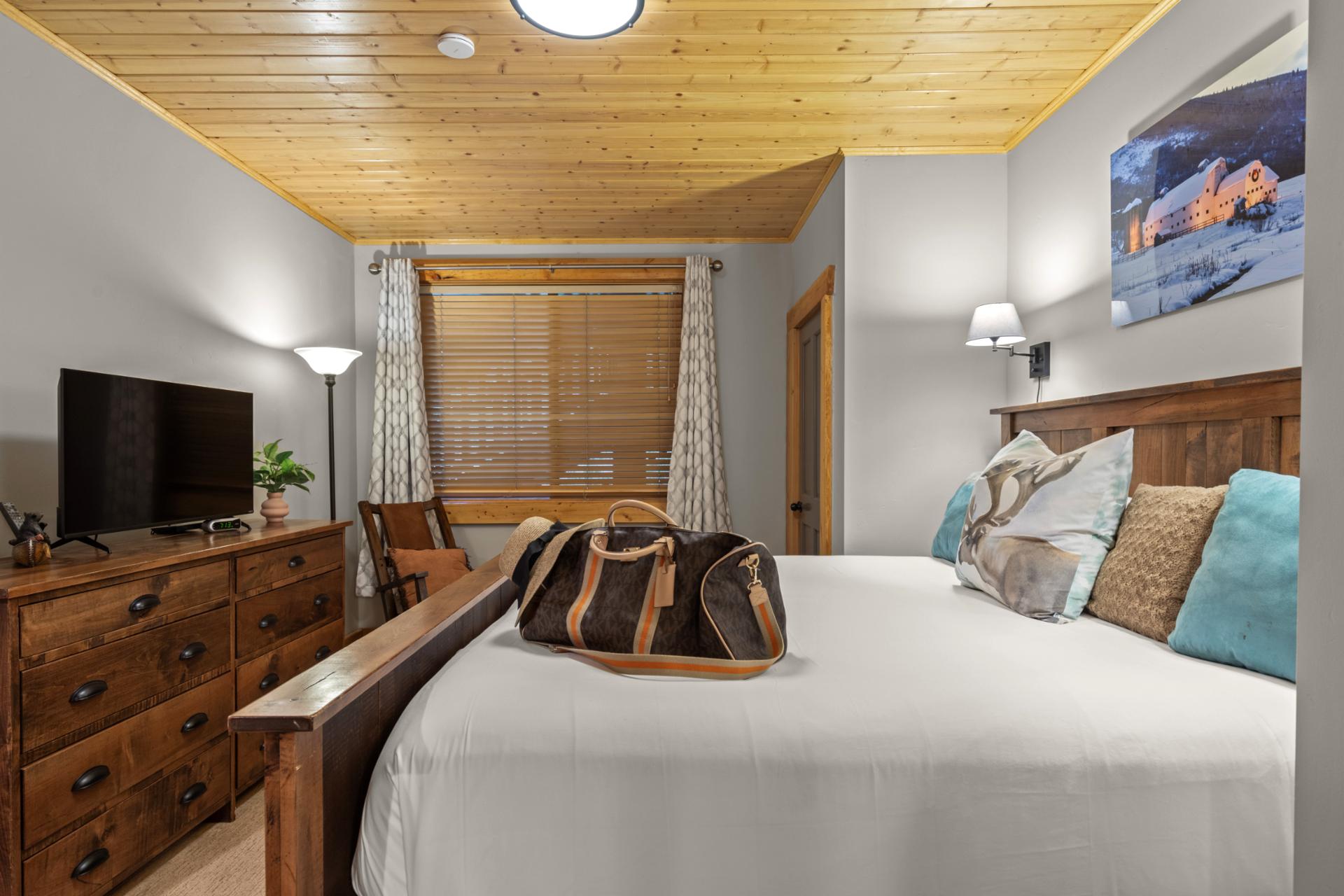 This cozy master suite includes a King bed and Smart TV for winding down in privacy.