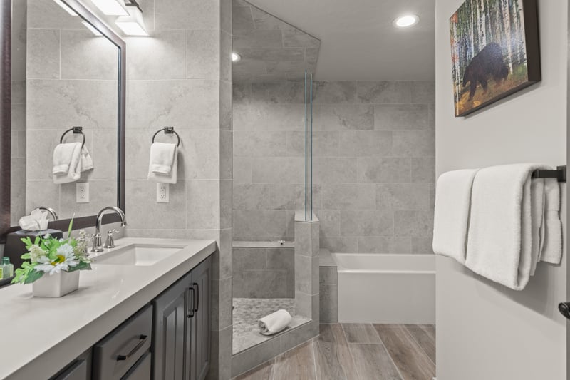 Enjoy a spa-like refresh in your ensuite bath with a vanity and walk-in shower and soaking tub.