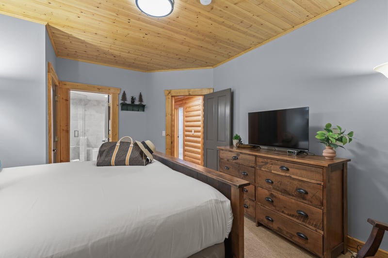 Primary bedroom includes a King bed and ensuite bath for added comfort.