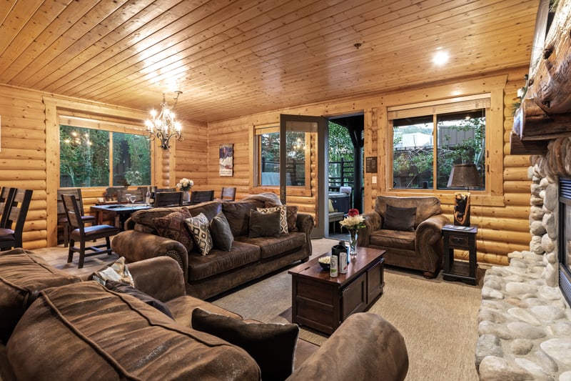 Settle in for a cozy evening around the fireplace with plenty of seating for your whole group.