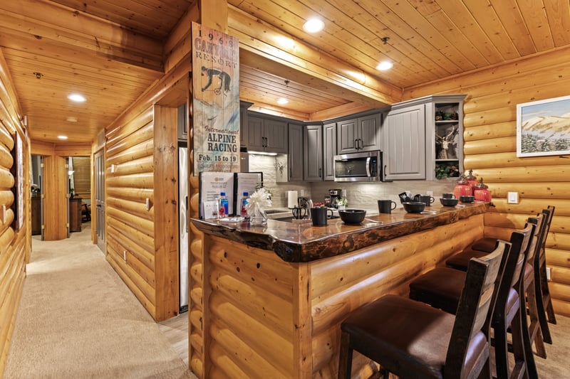 Prep meals or serve drinks with ease from this spacious and functional kitchen layout.