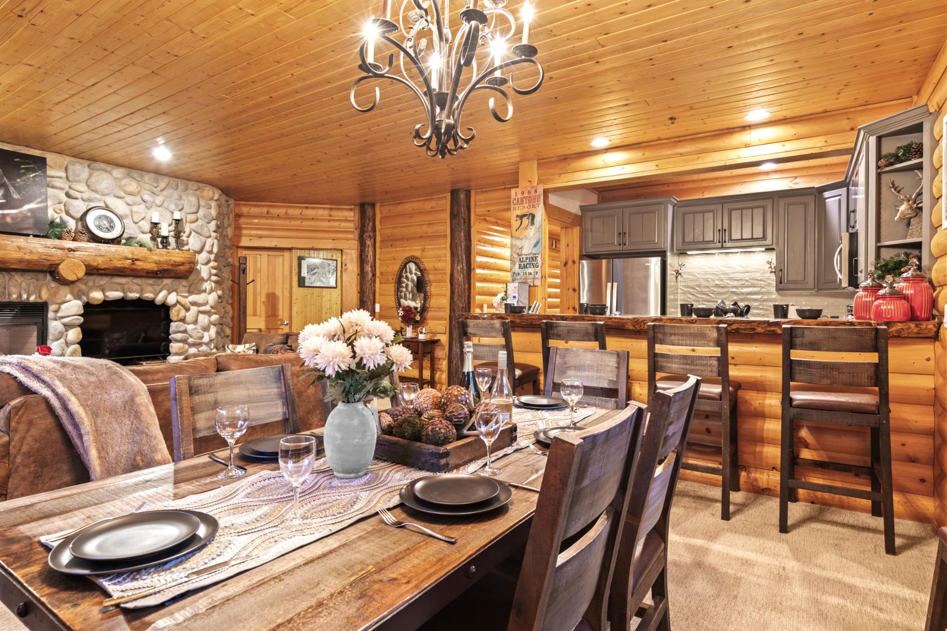 The dining room features wood furnishings and lodge accents, perfect for post-ski meals or morning coffee.