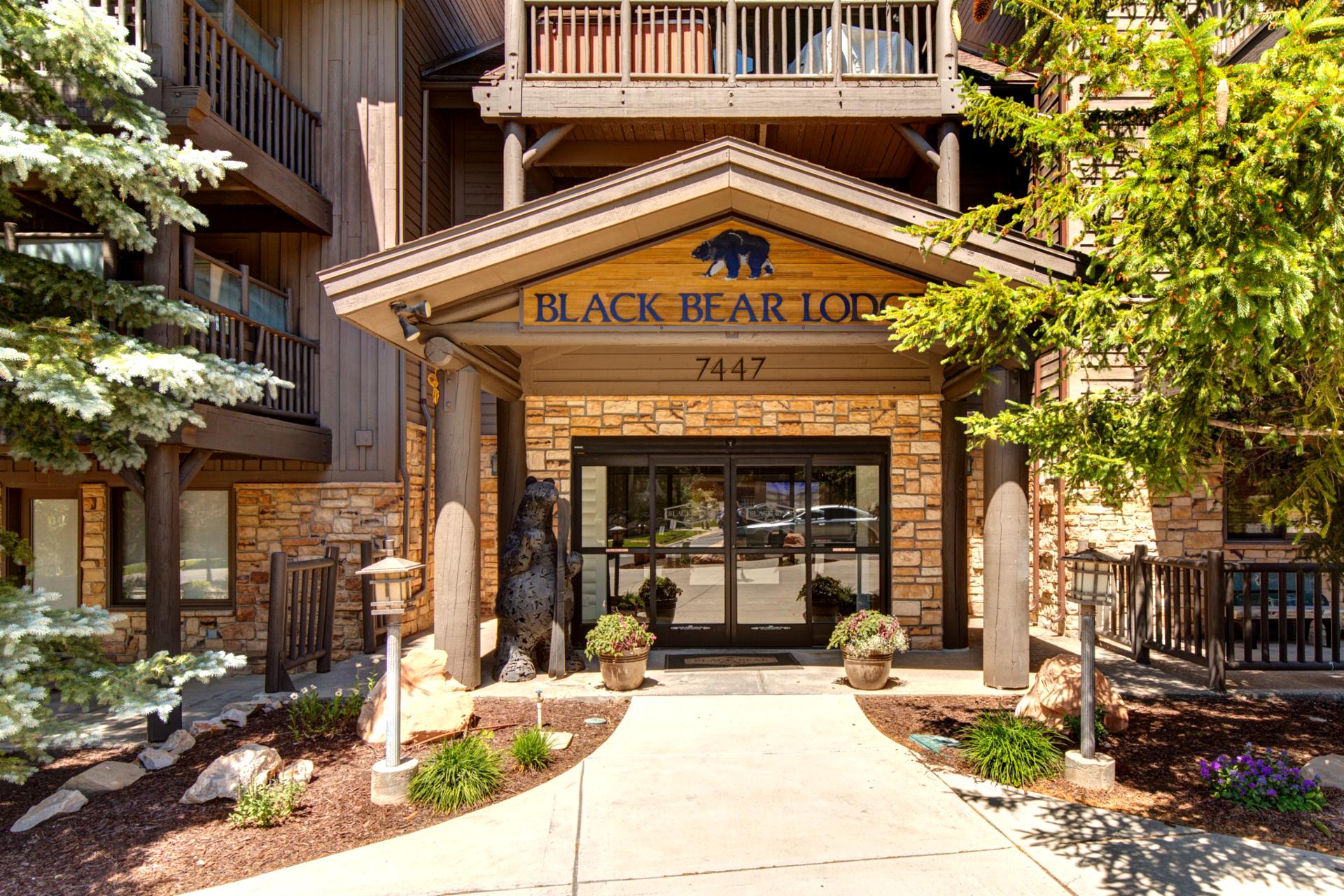 Rustic mountain architecture and a welcoming entrance set the tone for your stay at Black Bear Lodge.