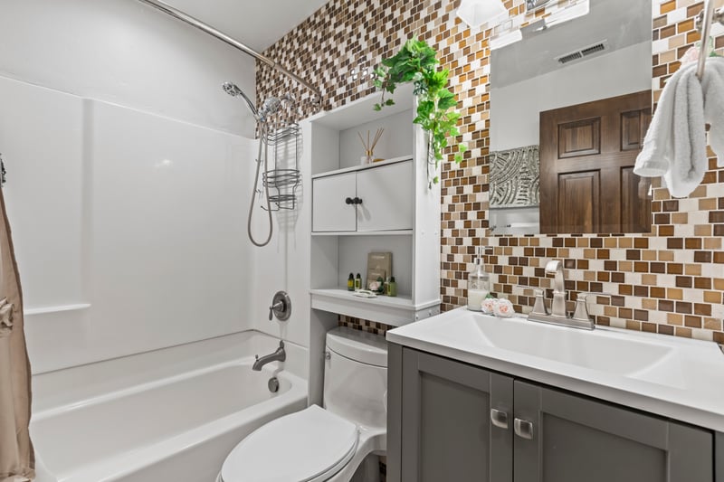 Your full bath includes a shower/tub combo with granite vanity