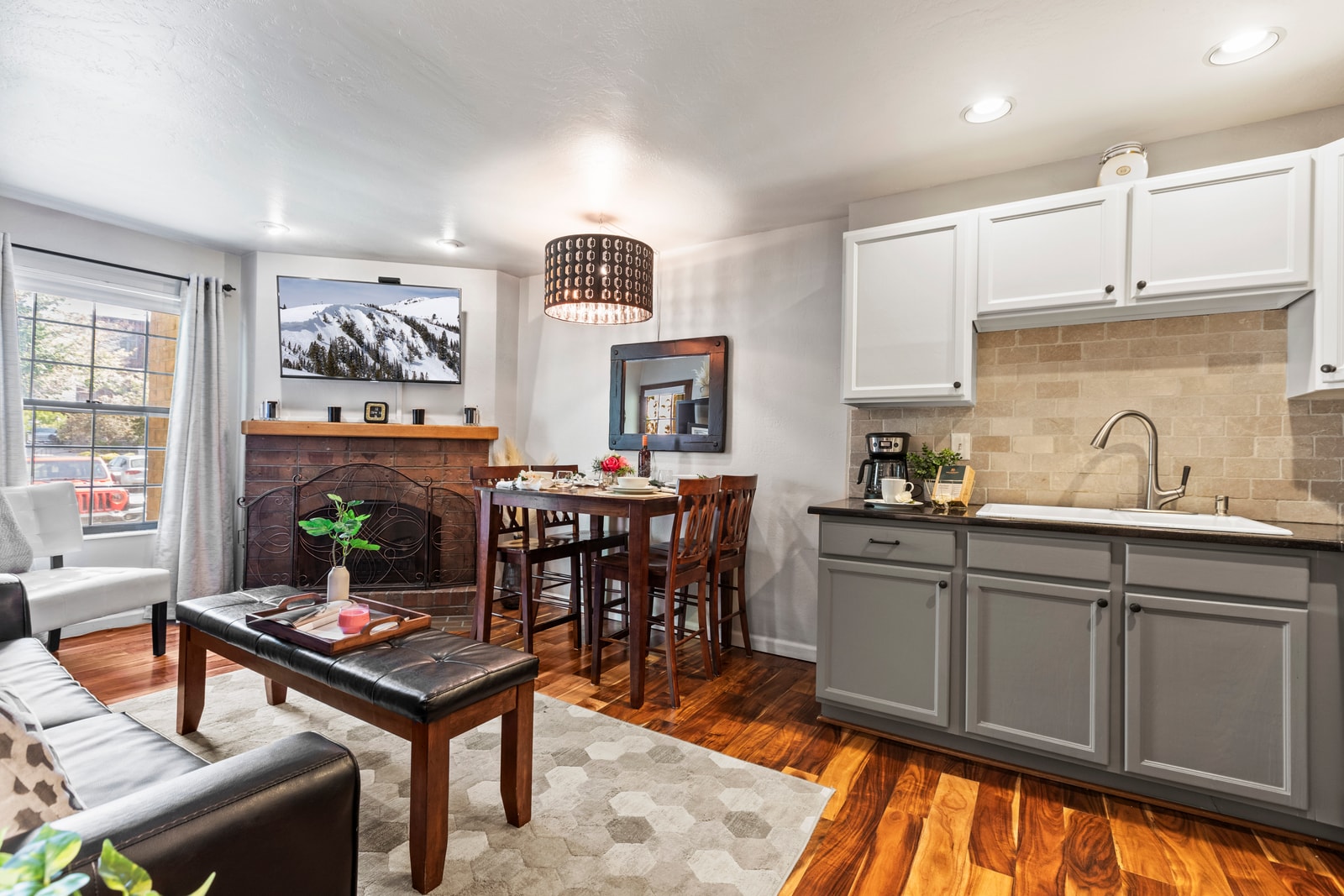Your full kitchen features a compact layout with everything you need for coffee, snacks, and simple meals.