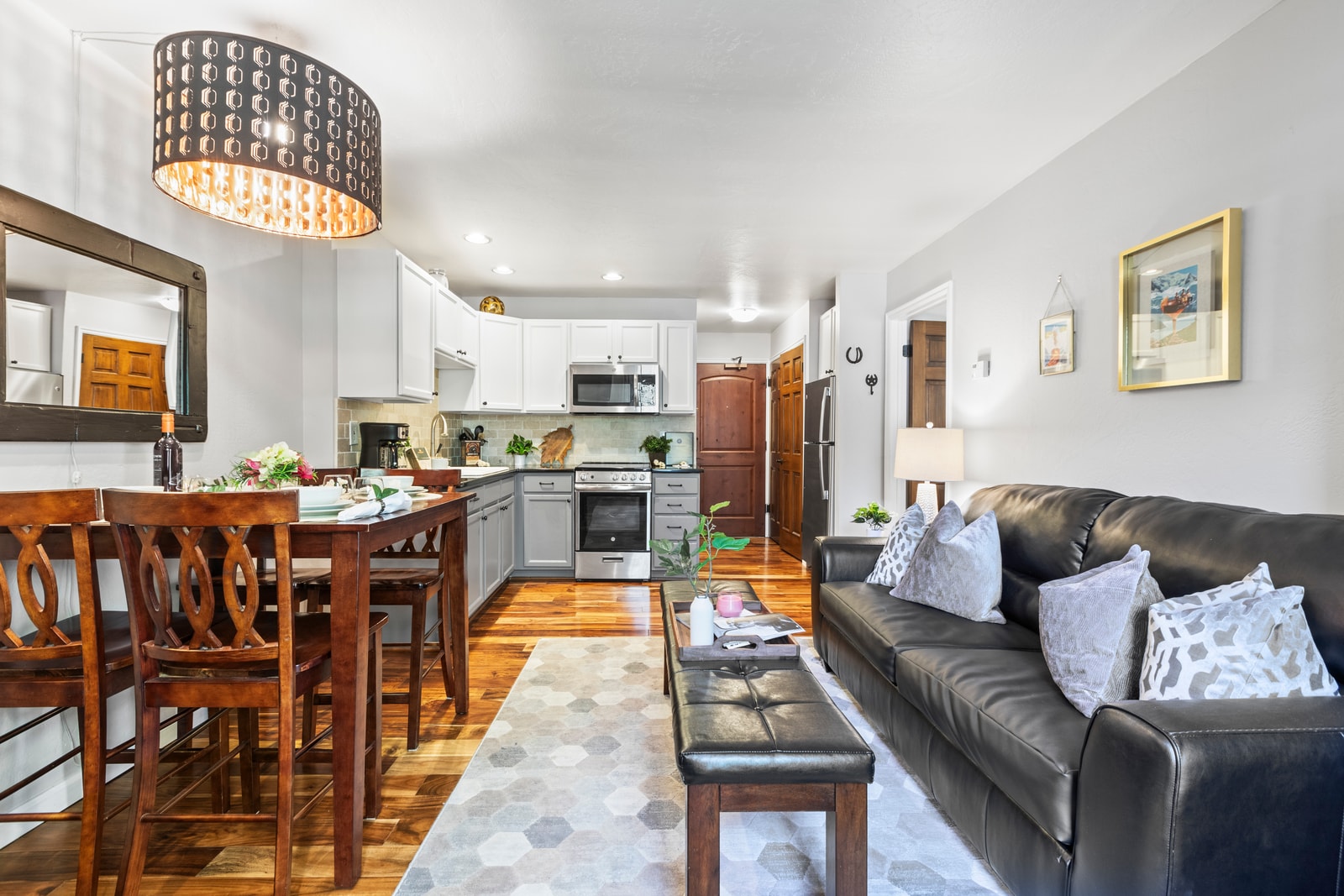 Open layout connects living, dining, and kitchen for seamless conversation and easy movement.