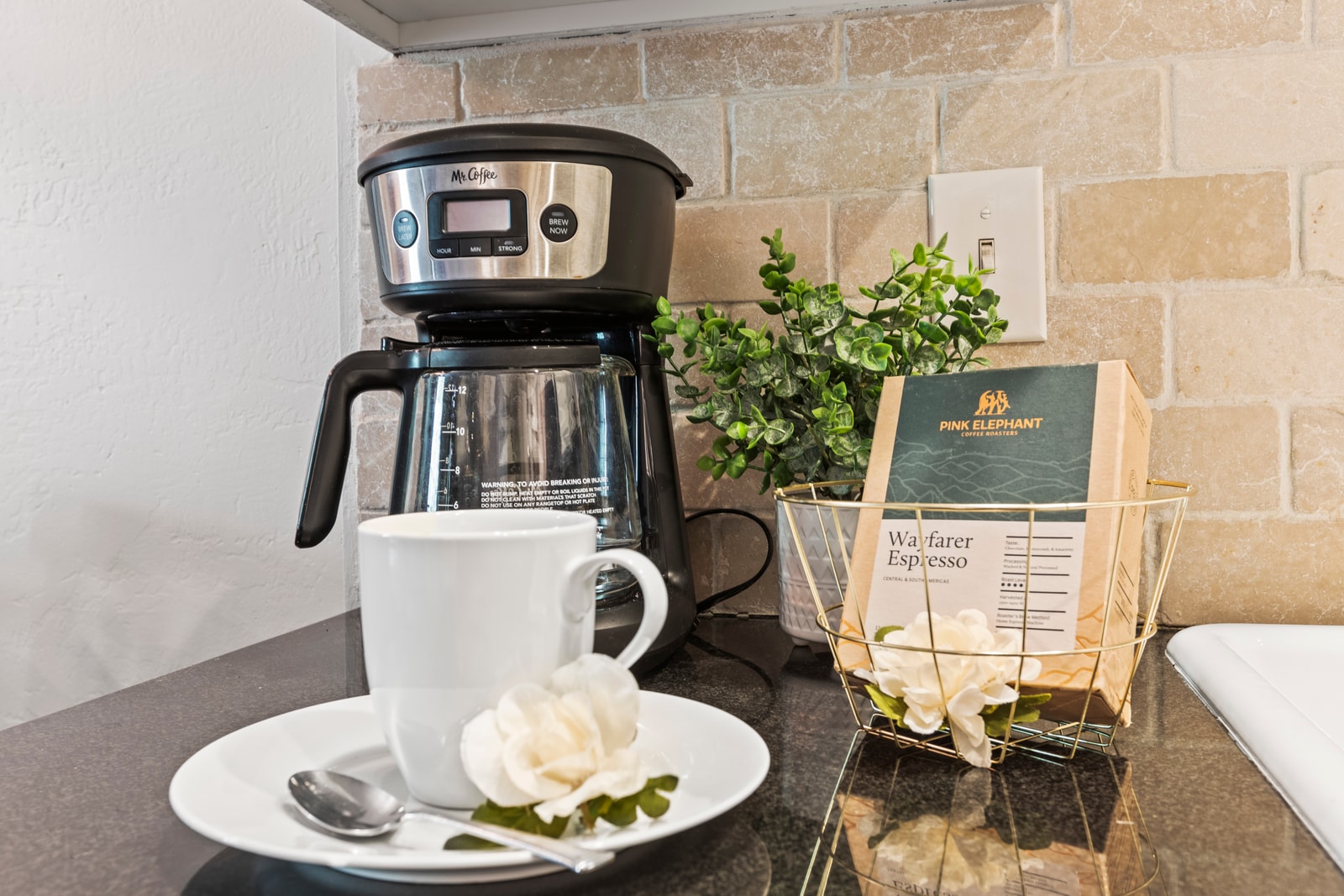 Start your day with a fresh brew from the in-unit coffee station stocked with local perks.