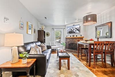 Chic mountain décor and soft lighting make the living room a relaxing retreat.