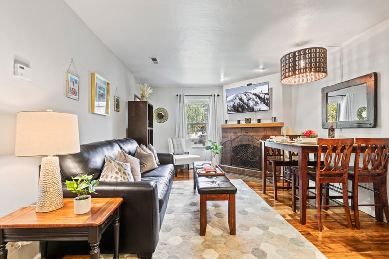 Chic mountain décor and soft lighting make the living room a relaxing retreat.