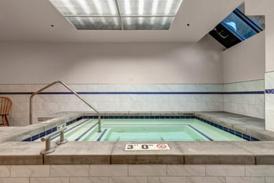 Soothing jets and warm water make this indoor spa a favorite year-round feature.