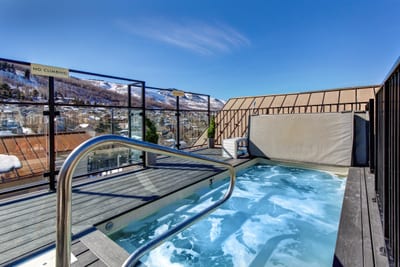 Enjoy rooftop hot tub access with stunning mountain views and fresh alpine air.